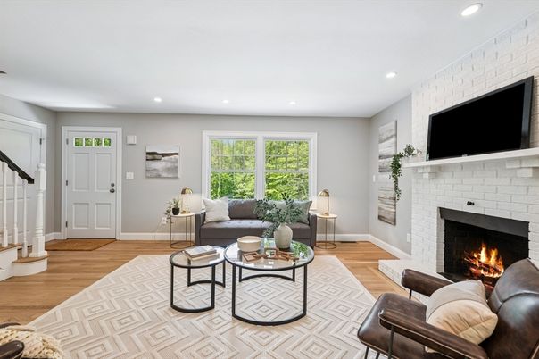 Fireplace, Interior, Living room, Recessed Lighting, Stone Walls, Wood Texture Flooring