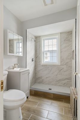 Bathroom, Glass Shower, Interior, Marble Walls, Wood Texture Flooring