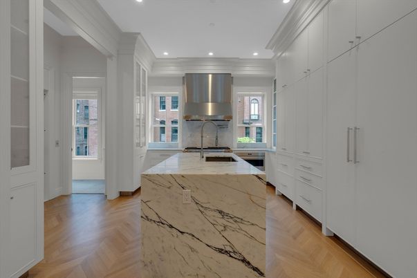 Interior, Kitchen, Marble Walls, Recessed Lighting, Stainless Steel Appliances, Wood Texture Flooring