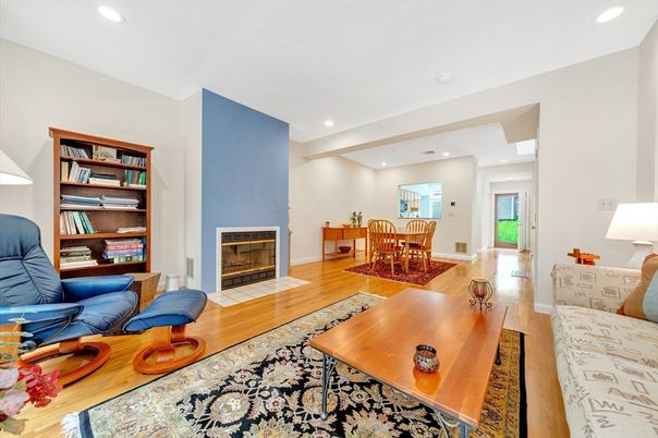 Dining room, Fireplace, Interior, Living room, Recessed Lighting, Wood Texture Flooring