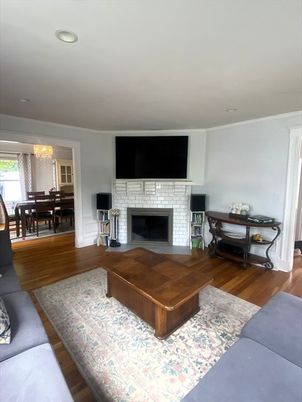 Chandelier, Dining room, Fireplace, Interior, Living room, Recessed Lighting, Wood Texture Flooring