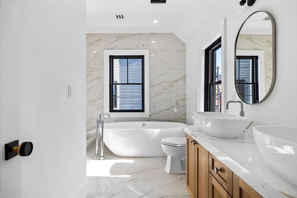 Bathroom, Dual Sink Vanities, Free Standing Baths, Interior, Marble, Marble Walls, Recessed Lighting