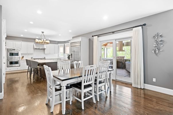Chandelier, Dining room, Interior, Kitchen, Recessed Lighting, Stainless Steel Appliances, Wood Texture Flooring
