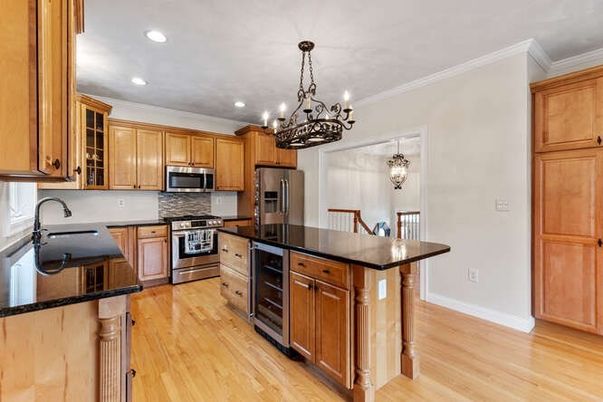 Chandelier, Interior, Kitchen, Pendant Lights, Recessed Lighting, Stainless Steel Appliances, Wood Texture Flooring