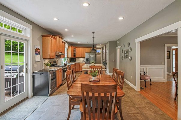 Dining room, Interior, Kitchen, Pendant Lights, Recessed Lighting, Stainless Steel Appliances, Wood Texture Flooring