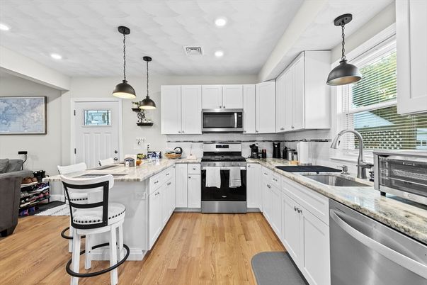 Interior, Kitchen, Pendant Lights, Recessed Lighting, Stainless Steel Appliances, Wood Texture Flooring