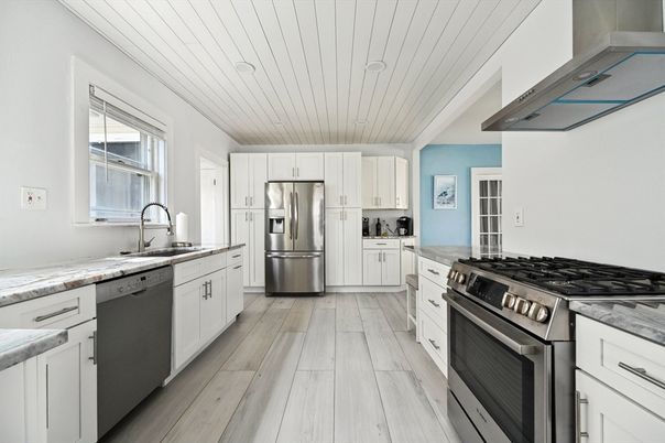 Interior, Kitchen, Recessed Lighting, Stainless Steel Appliances, Wood Texture Flooring