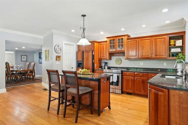 Dining room, Interior, Kitchen, Pendant Lights, Recessed Lighting, Stainless Steel Appliances, Wood Texture Flooring
