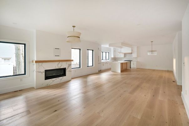 Empty room, Fireplace, Interior, Kitchen, Pendant Lights, Wood Texture Flooring