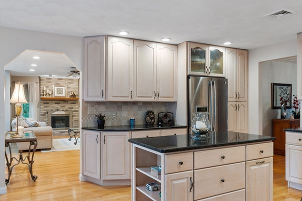 Fireplace, Interior, Kitchen, Living room, Recessed Lighting, Stainless Steel Appliances, Stone Walls, Wood Texture Flooring