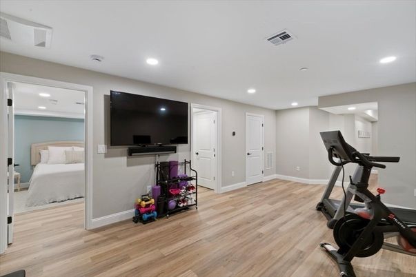 Bedroom, Fitness Equipment, Interior, Recessed Lighting, Wood Texture Flooring
