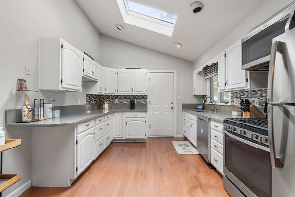 Glass Ceilings, Interior, Kitchen, Recessed Lighting, Stainless Steel Appliances, Wood Texture Flooring