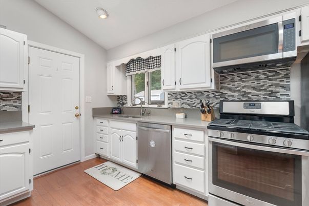 Interior, Kitchen, Recessed Lighting, Stainless Steel Appliances, Wood Texture Flooring