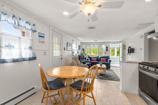 Dining room, Interior, Kitchen, Living room, Recessed Lighting, Stainless Steel Appliances, Wood Texture Flooring
