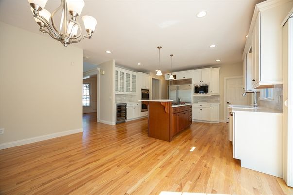 Chandelier, Interior, Kitchen, Pendant Lights, Recessed Lighting, Stainless Steel Appliances, Wood Texture Flooring