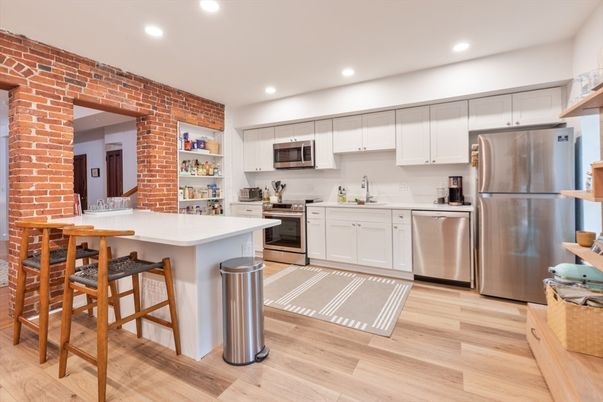 Interior, Kitchen, Recessed Lighting, Stainless Steel Appliances, Stone Walls, Wood Texture Flooring