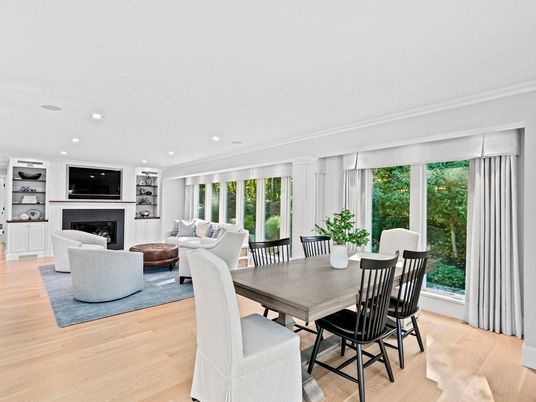 Dining room, Fireplace, Interior, Living room, Recessed Lighting, Wood Texture Flooring