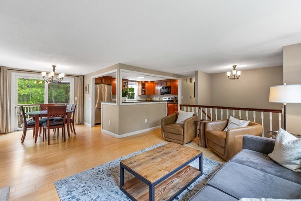 Chandelier, Dining room, Interior, Kitchen, Living room, Stainless Steel Appliances, Wood Texture Flooring