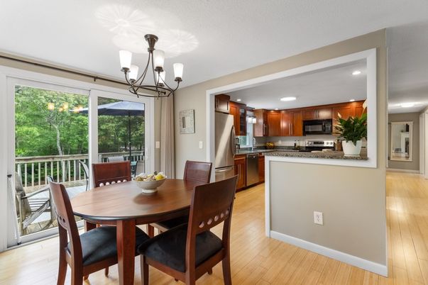 Chandelier, Dining room, Interior, Kitchen, Recessed Lighting, Stainless Steel Appliances, Wood Texture Flooring