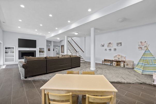 Dining room, Fireplace, Interior, Living room, Recessed Lighting, Wood Texture Flooring