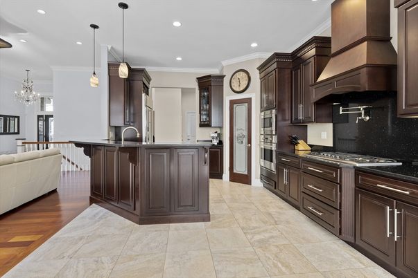Chandelier, Interior, Kitchen, Pendant Lights, Recessed Lighting, Stainless Steel Appliances, Wood Texture Flooring
