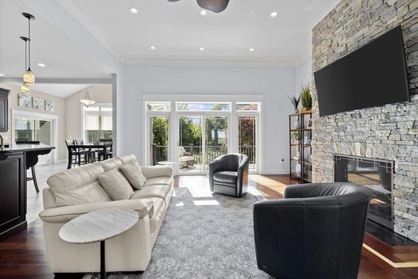 Dining room, Fireplace, Interior, Living room, Pendant Lights, Recessed Lighting, Stone Walls, Wood Texture Flooring