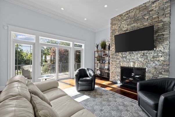 Fireplace, Interior, Living room, Recessed Lighting, Stone Walls, Wood Texture Flooring
