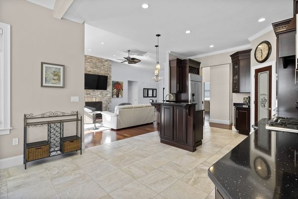 Fireplace, Interior, Kitchen, Living room, Pendant Lights, Recessed Lighting, Stone Walls, Wood Texture Flooring