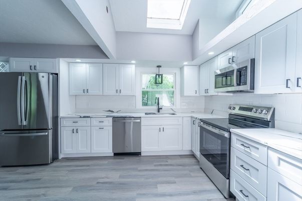 Interior, Kitchen, Recessed Lighting, Stainless Steel Appliances, Wood Texture Flooring