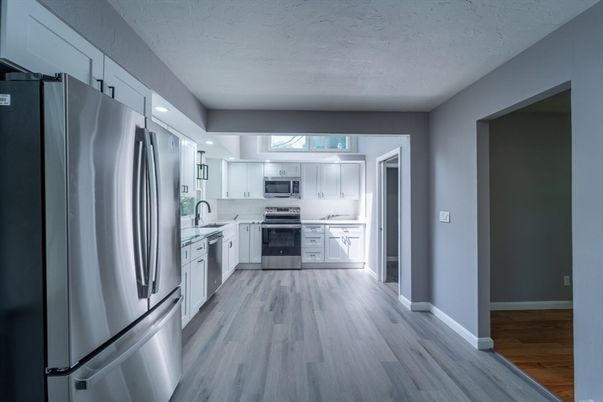 Interior, Kitchen, Recessed Lighting, Stainless Steel Appliances, Wood Texture Flooring