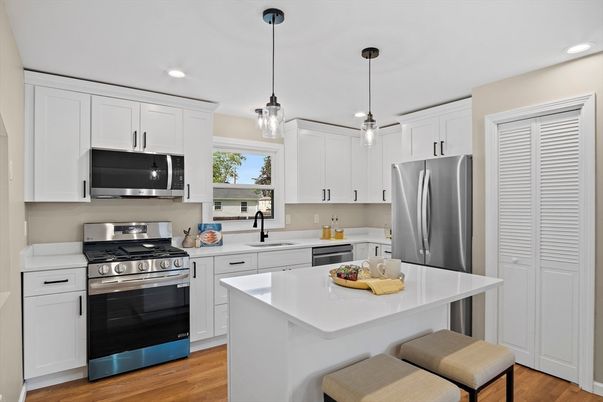 Interior, Kitchen, Pendant Lights, Recessed Lighting, Stainless Steel Appliances, Wood Texture Flooring