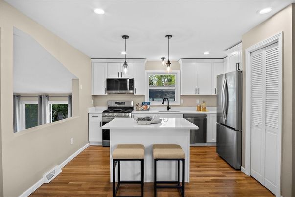Interior, Kitchen, Pendant Lights, Recessed Lighting, Stainless Steel Appliances, Wood Texture Flooring