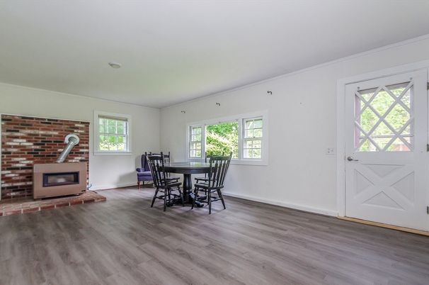 Dining room, Fireplace, Interior, Stone Walls, Wood Texture Flooring