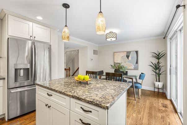Dining room, Interior, Kitchen, Pendant Lights, Recessed Lighting, Stainless Steel Appliances, Wood Texture Flooring