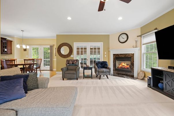 Dining room, Fireplace, Interior, Living room, Pendant Lights, Recessed Lighting, Wood Texture Flooring