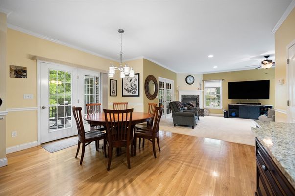 Dining room, Fireplace, Interior, Living room, Pendant Lights, Recessed Lighting, Wood Texture Flooring