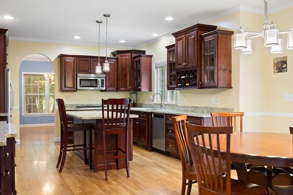 Dining room, Interior, Kitchen, Pendant Lights, Recessed Lighting, Stainless Steel Appliances, Wood Texture Flooring