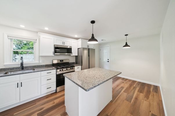 Interior, Kitchen, Pendant Lights, Recessed Lighting, Stainless Steel Appliances, Wood Texture Flooring