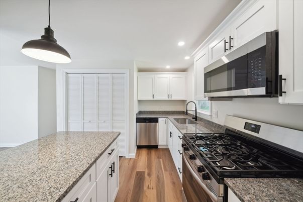 Interior, Kitchen, Pendant Lights, Recessed Lighting, Stainless Steel Appliances, Wood Texture Flooring