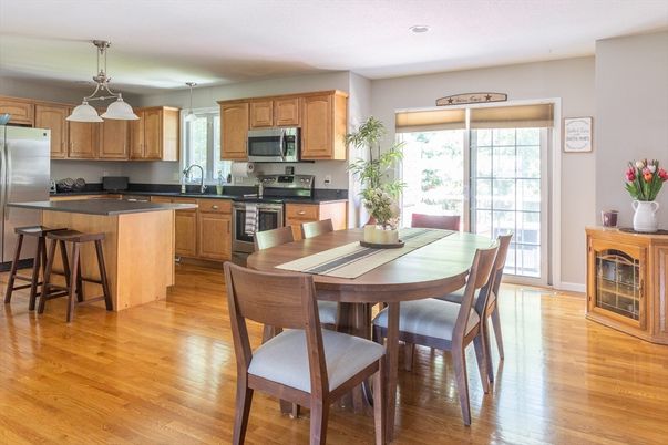Dining room, Interior, Kitchen, Pendant Lights, Recessed Lighting, Stainless Steel Appliances, Wood Texture Flooring