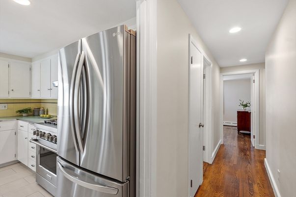 Interior, Kitchen, Recessed Lighting, Stainless Steel Appliances, Wood Texture Flooring