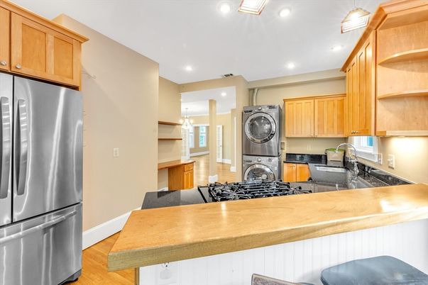 Interior, Kitchen, Recessed Lighting, Washer, Wood Texture Flooring
