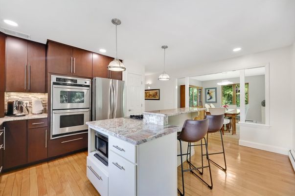 Dining room, Interior, Kitchen, Pendant Lights, Recessed Lighting, Stainless Steel Appliances, Wood Texture Flooring