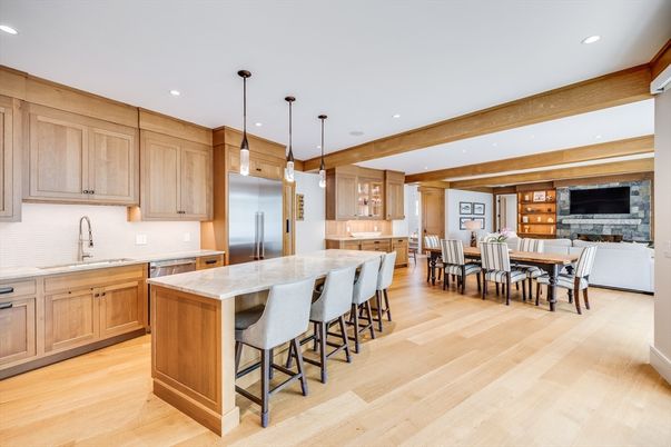 Dining room, Fireplace, Interior, Kitchen, Pendant Lights, Recessed Lighting, Stainless Steel Appliances, Wooden Beams, Wood Texture Flooring