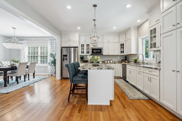 Chandelier, Dining room, Interior, Kitchen, Pendant Lights, Recessed Lighting, Stainless Steel Appliances, Wood Texture Flooring