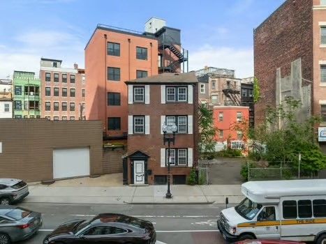 Exterior, Facade, Brick Facade, Condo Building