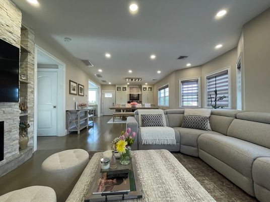 Fireplace, Interior, Living room, Pendant Lights, Recessed Lighting, Stone Walls, Wood Texture Flooring