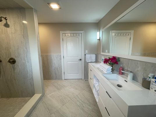 Bathroom, Dual Sink Vanities, Interior, Marble, Marble Walls, Recessed Lighting