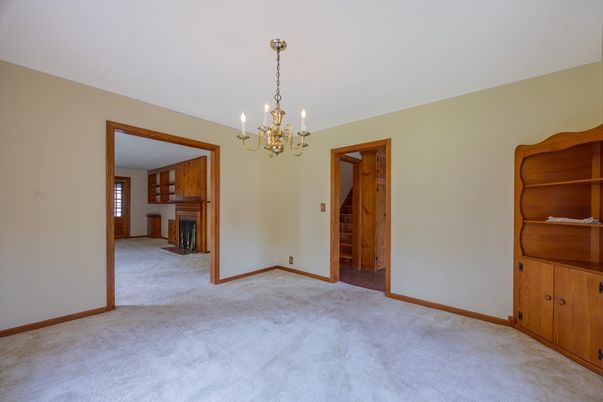 Chandelier, Empty room, Fireplace, Interior