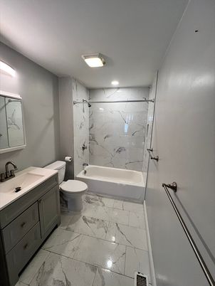 Bathroom, Dual Sink Vanities, Interior, Marble, Marble Walls, Recessed Lighting